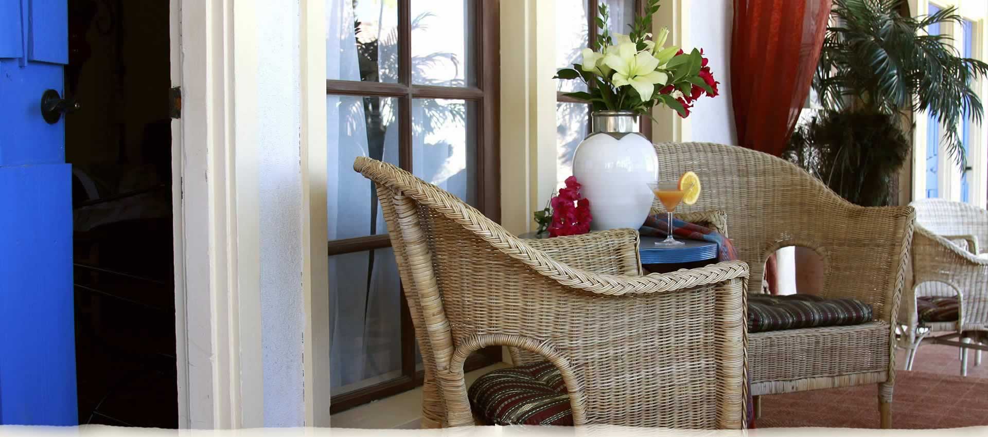 Chairs with flower arrangement and Morocco-tini cocktail